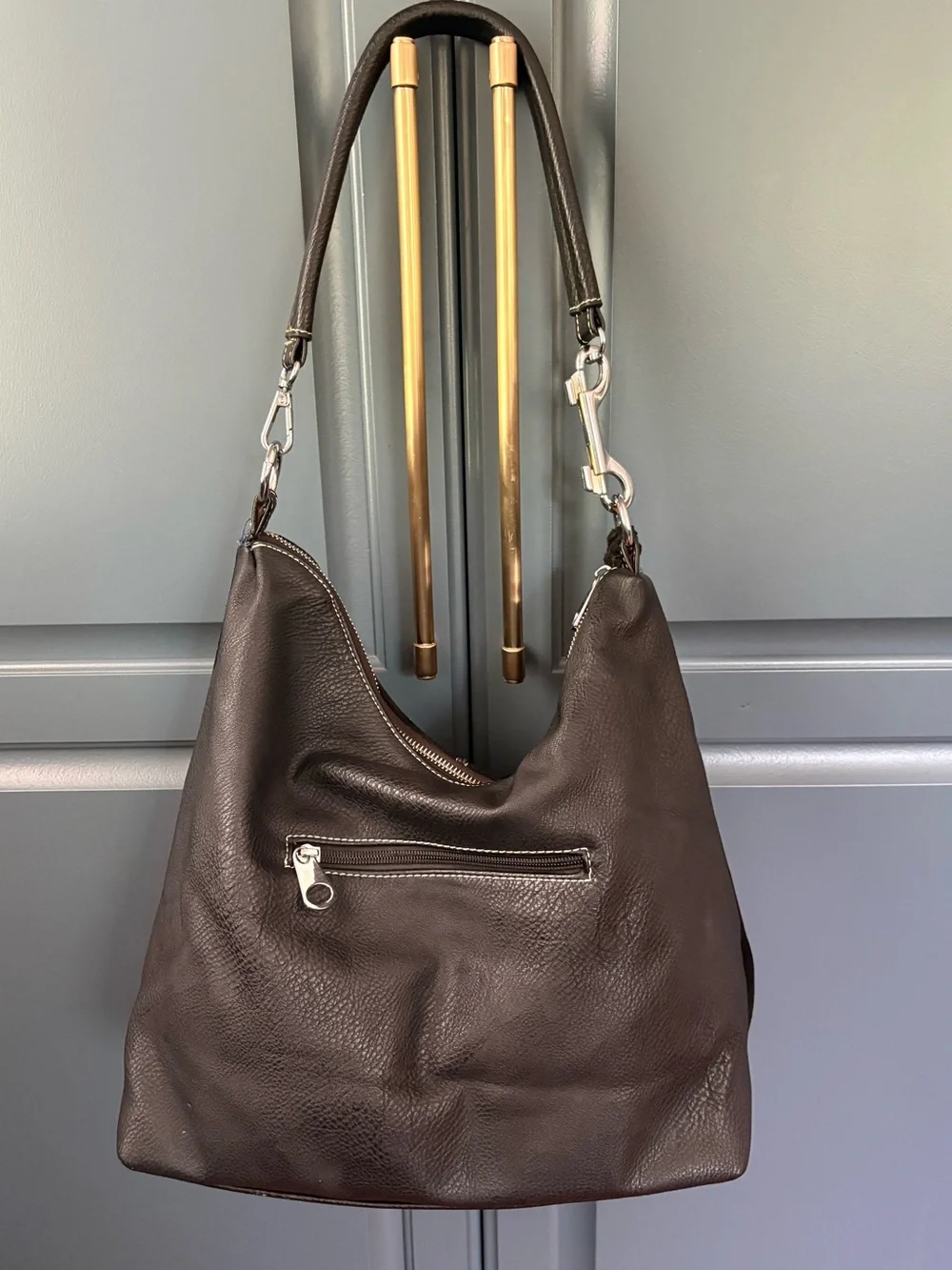 black suede Coco + Carmen hobo bag whipstitching and fringe tassels